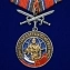 Сувенирная медаль "Ветеран боевых действий" с мечами в футляре с отделением под удостоверение