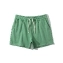 Спортивные короткие шорты для бега и фитнеса цвет зеленый
