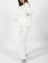 Вязаный костюм женский оверсайз кофта с капюшоном и широкие штаны цвет белый